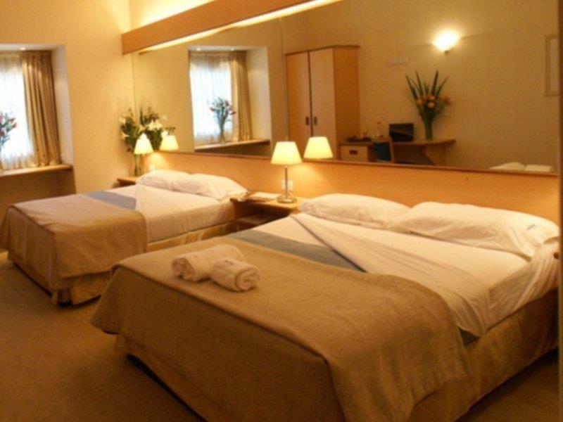 Hotel Aeroparque Inn & Suites Буенос Айрес Екстериор снимка