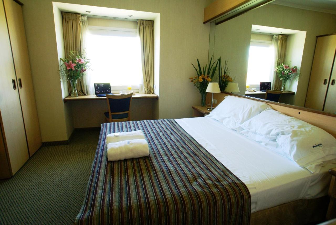 Hotel Aeroparque Inn & Suites Буенос Айрес Екстериор снимка